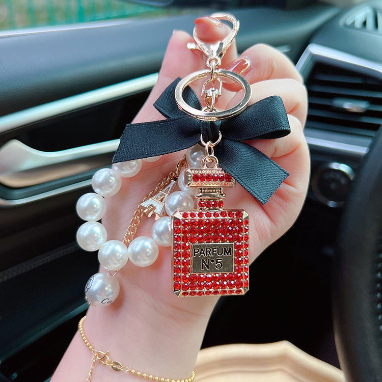 Exquisite Rhinestone Bow & Perfume Bottle Bag Charm