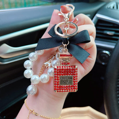 Exquisite Rhinestone Bow & Perfume Bottle Bag Charm