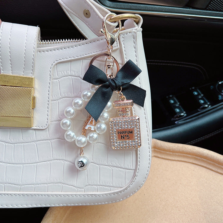 Exquisite Rhinestone Bow & Perfume Bottle Bag Charm